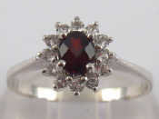 Appraisal: A carat white gold garnet ring size N gms