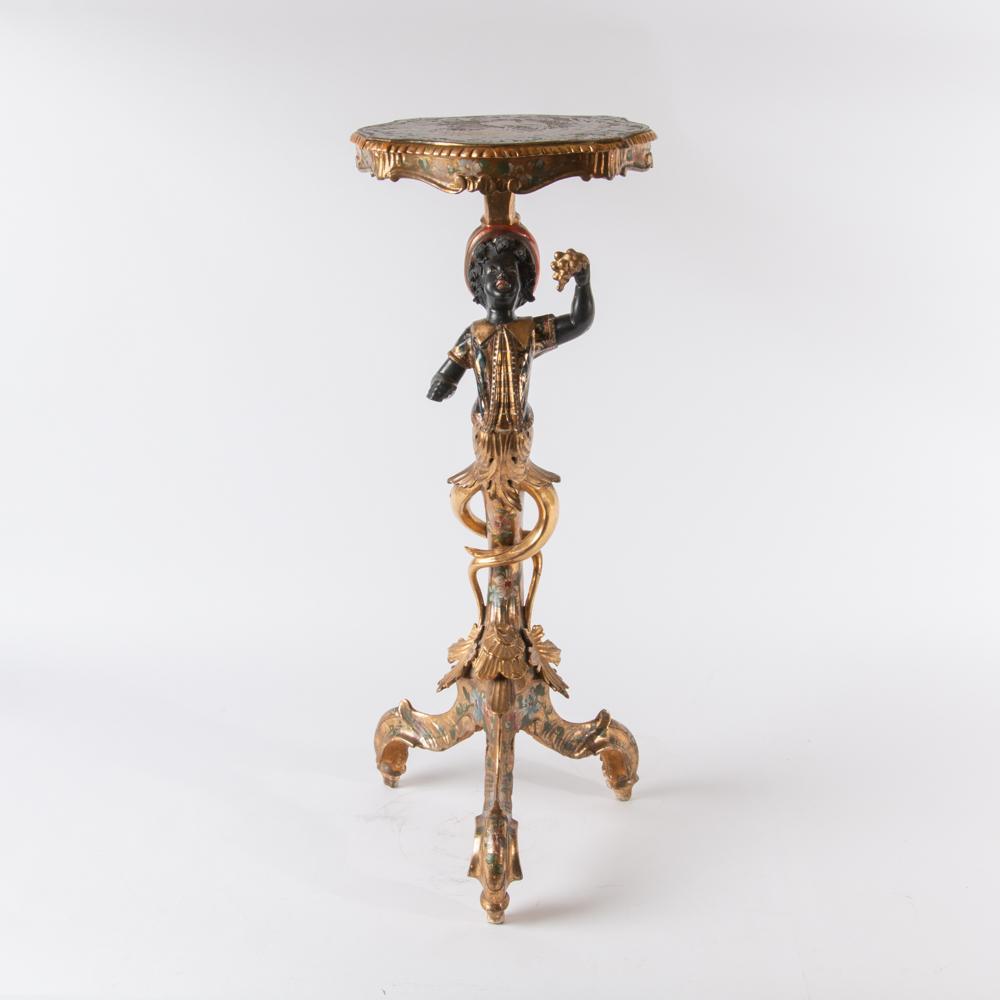 Appraisal: TH C SCULPTURAL VENETIAN BLACKAMOOR TABLE A figural gilt wood