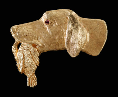 Appraisal: Hunting Dog Gold Pin with bird in mouth kt yellow