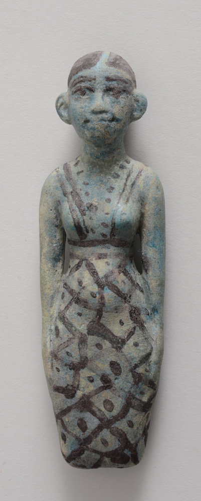 Appraisal: EGYPTIAN PAINTED TURQUOISE-GLAZED POTTERY FIGURE OF A GIRL Modeled in