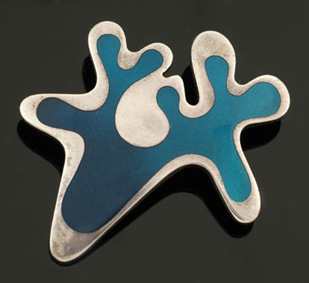 Appraisal: A silver and enamel brooch by Georg Jensen Designed by