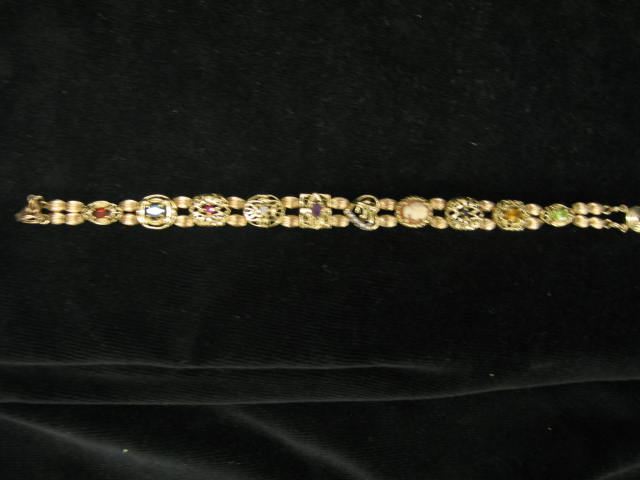 Appraisal: K Gold Slide Bracelet slides yellow gold gems throughout