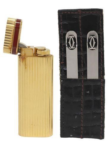 Appraisal: lot of Cartier accessories including gold-plated Godron Striped oval lighter