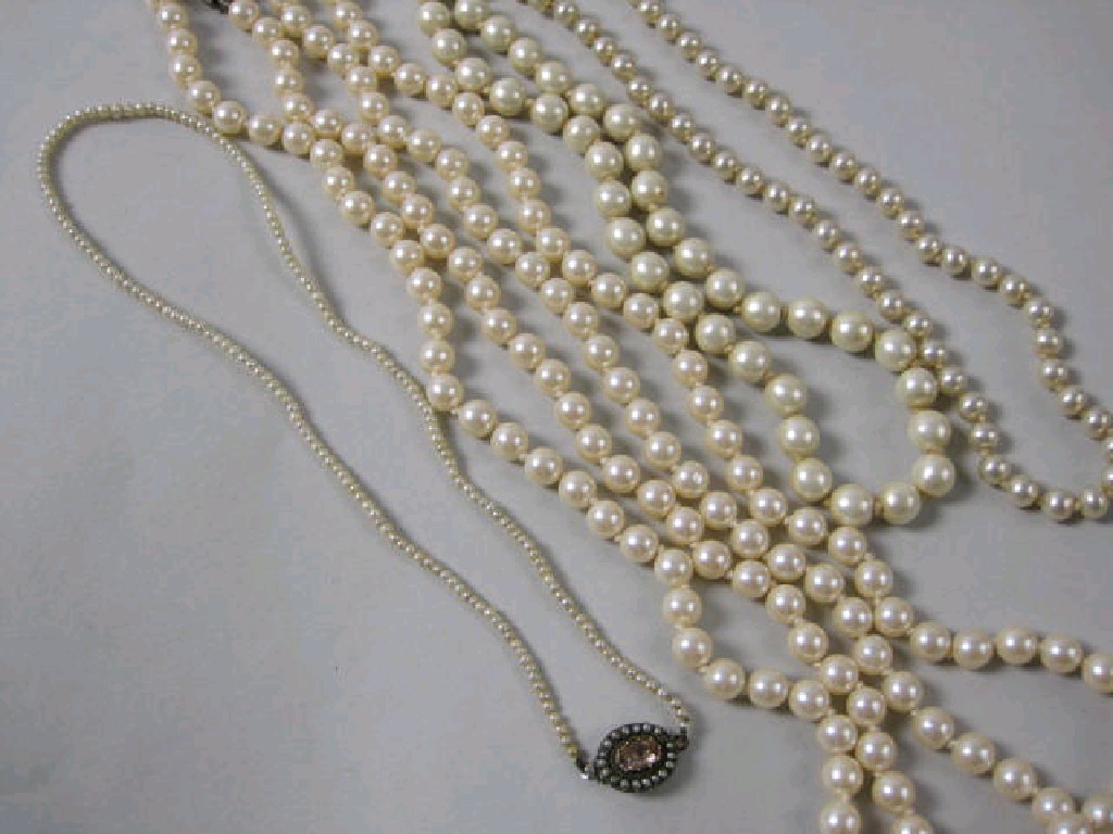 Appraisal: A Seed Pearl Necklace with oval clasp a long simulated