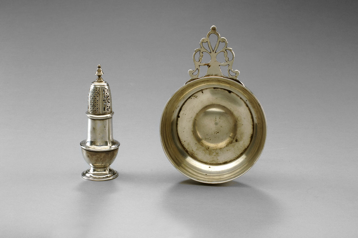 Appraisal: AMERICAN SILVER CASTER AND A PORRINGER EARLY-MID EIGHTEENTH CENTURY The