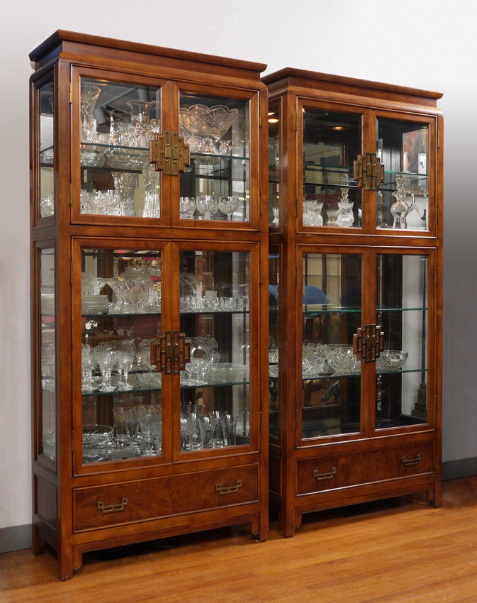 Appraisal: PAIR CHINESE STYLE CURIO CHINA DISPLAY CABINETS Upright display cases