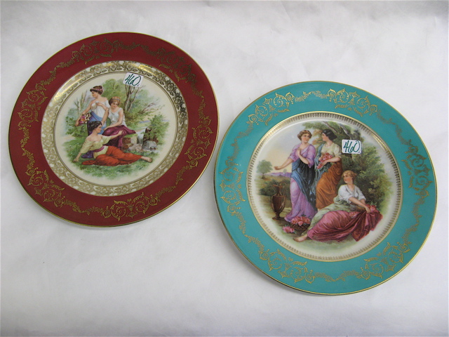 Appraisal: TWO GERMAN PORTRAIT PLATES depicting ladies in waiting one plate