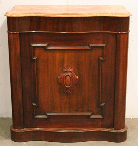 Appraisal: A Victorian mahogany serpentine topped side cabinet with marble top