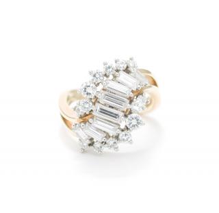 Appraisal: A DIAMOND CLUSTER RING WITH BAGUETTES A DIAMOND CLUSTER RING