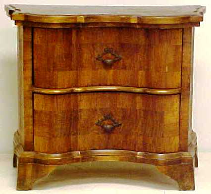 Appraisal: Diminutive two drawer chest with serpentine front veneered top sides