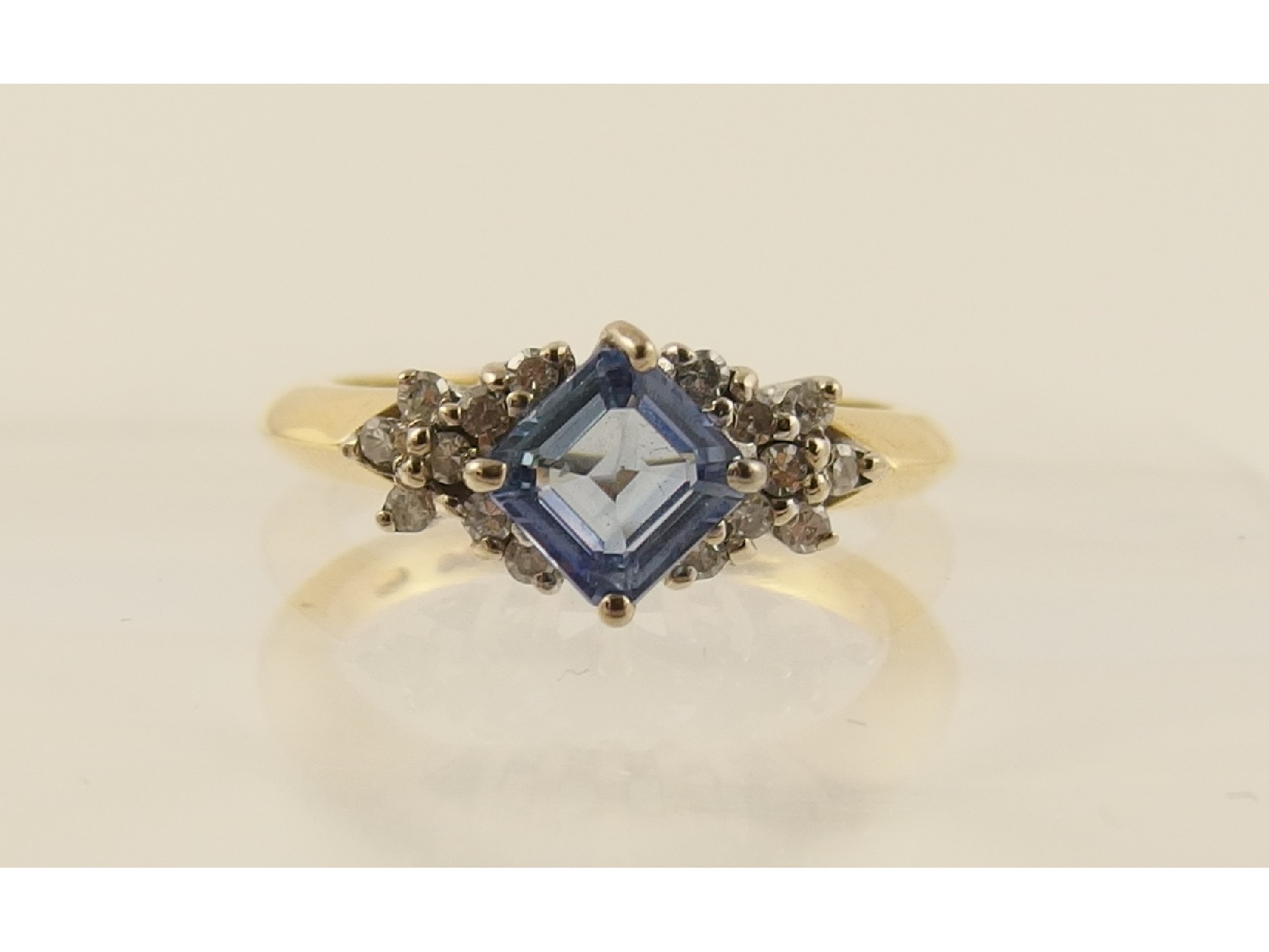 Appraisal: An ct diamond and blue gem stone ring