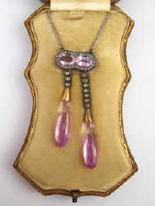 Appraisal: A fine th century neglig e pendant necklace set with