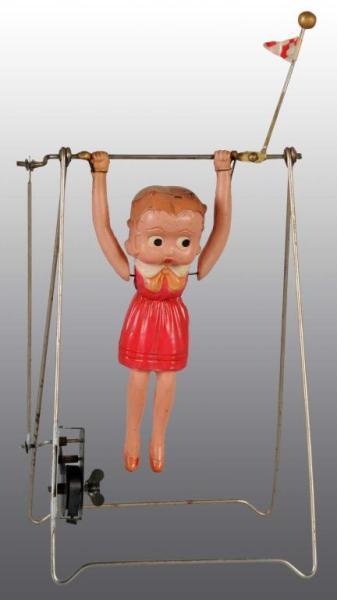 Appraisal: Celluloid Betty Boop Swing Wind-Up Toy Description Pre-war Japanese Working