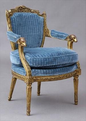 Appraisal: LOUIS XVI-STYLE CARVED GILTWOOD FAUTEUIL EN CABRIOLET The shield-shape padded