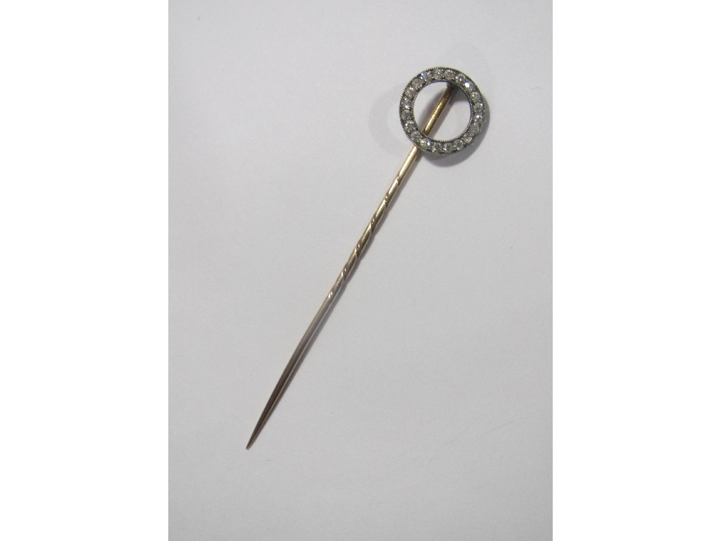 Appraisal: Nineteen thirties gold stick pin with open circular diamond top