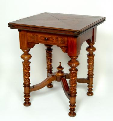 Appraisal: A CONTINENTAL WALNUT AND MARQUETRY CARD TABLE of square envelope