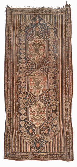 Appraisal: A LURI BLUE GROUND CARPET with a central interconnecting triple