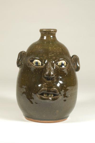 Appraisal: Signed Anita Meaders Georgia Alkaline glazed stoneware face jug H