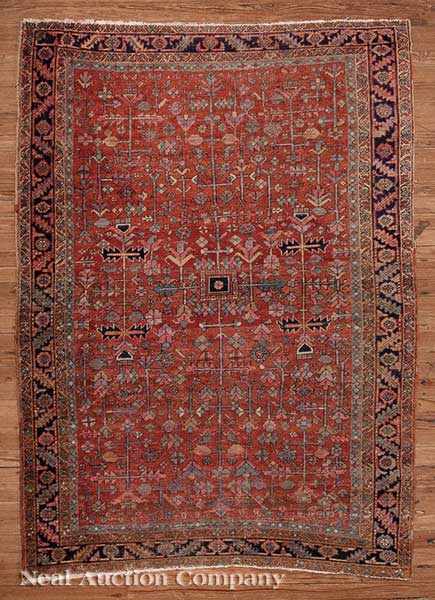 Appraisal: A Semi-Antique Persian Carpet ochre ground with repeating floral designs