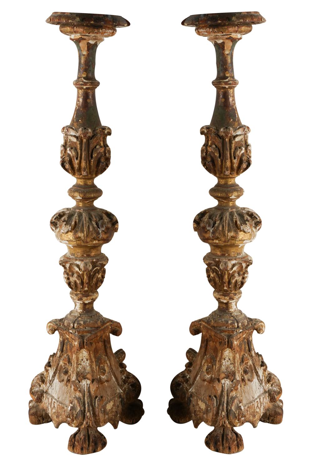 Appraisal: PAIR OF CARVED GILTWOOD ALTAR STICKSCondition with paint loss to