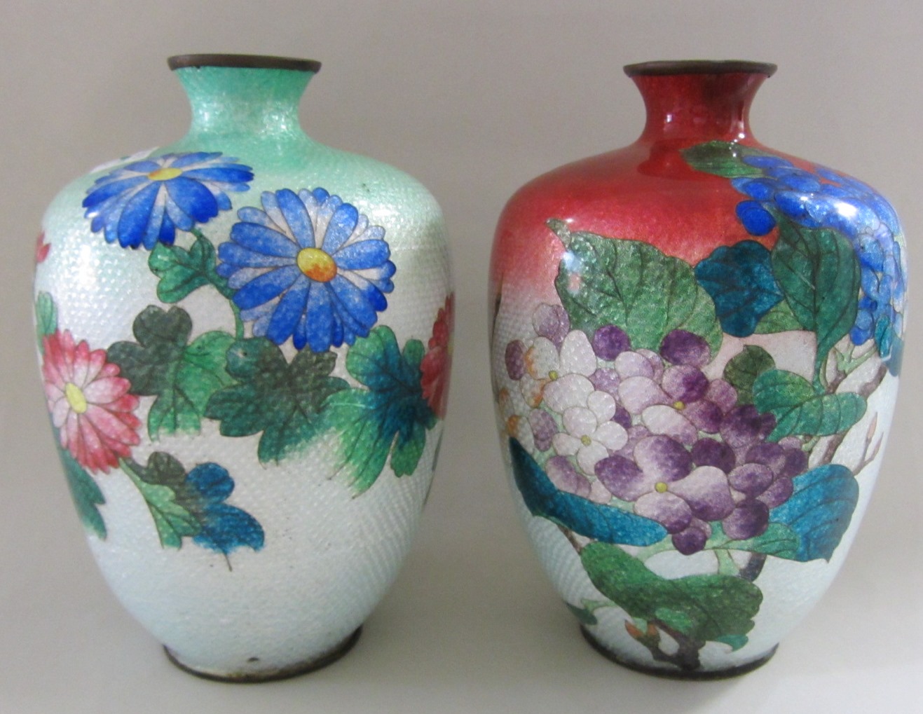 Appraisal: A pair of Japanese ginbari enamel ovoid vases Meiji period