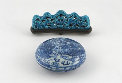 Appraisal: A Chinese porcelain turquoise-glazed brush rest moulded as a scaly