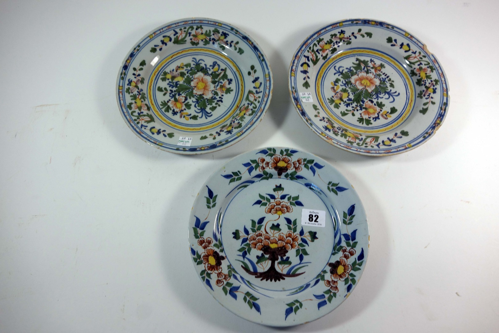 Appraisal: A Bristol polychrome delftware plate circa painted in the centre