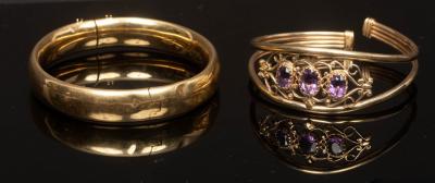 Appraisal: A ct yellow gold bangle set with three oval amethysts