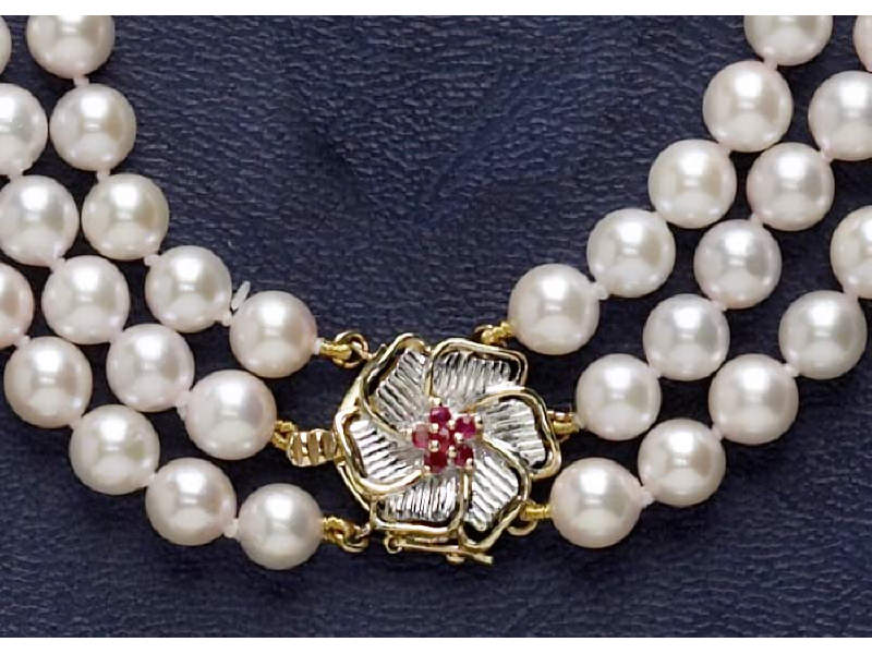 Appraisal: PEARL NECKLACE Triple strand mm cultured pearl necklace set with