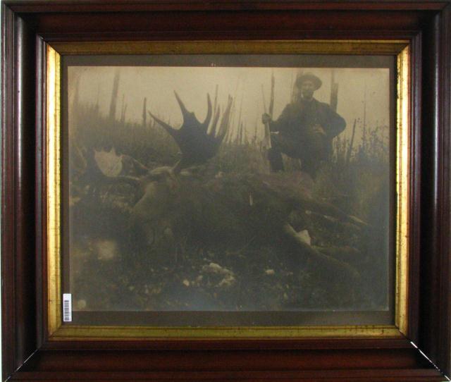 Appraisal: Antique Elk Hunter Framed Photograph depicting a proud hunter with