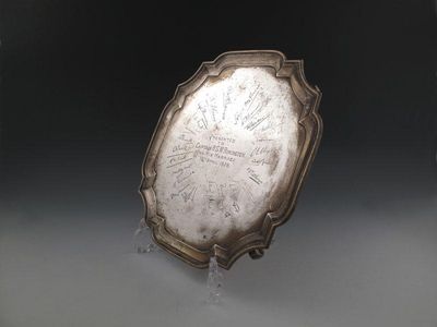 Appraisal: A presentation silver salver by Charles Stuart Harris London shaped