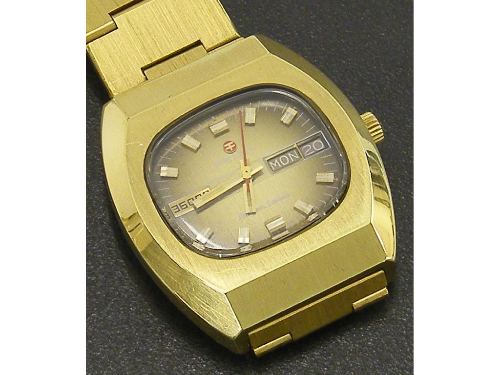 Appraisal: Felca Golden Sands automatic gold plated gentleman's bracelet watch jewels