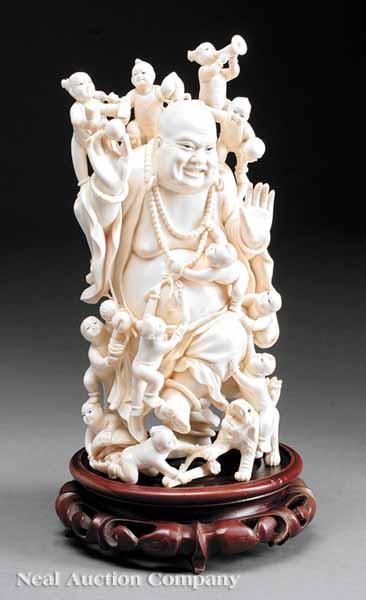 Appraisal: A Large Chinese Carved Ivory Figural Group of Budai the