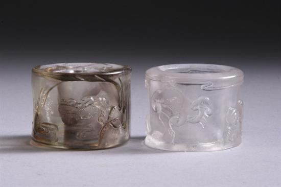 Appraisal: TWO CHINESE ROCK CRYSTAL ARCHER RINGS Qing Dynasty One carved