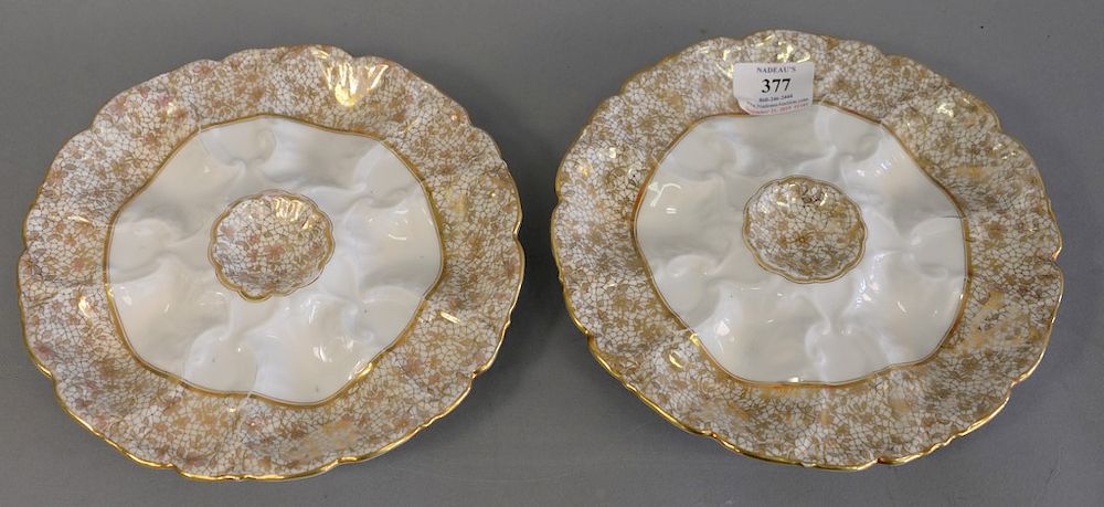 Appraisal: Set of twelve French gilt decorated oyster plates marked red