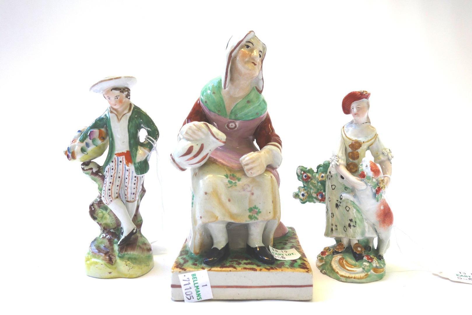 Appraisal: A group of Staffordshire pottery figures early th century and