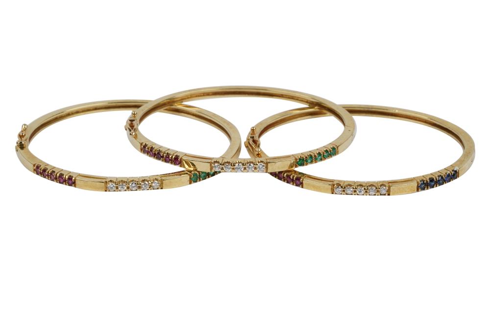 Appraisal: THREE KARAT YELLOW GOLD DIAMOND MULTI-GEM BANGLE BRACELETStwo bracelets containing