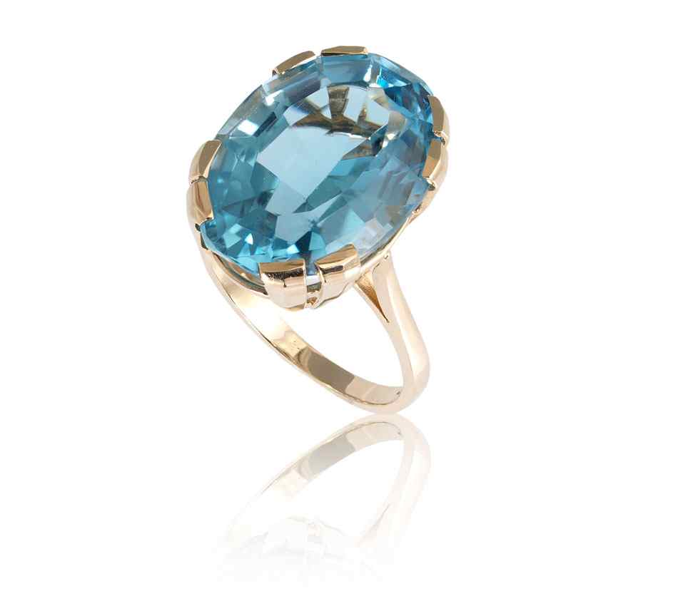 Appraisal: CT LONDON BLUE TOPAZ RING K yellow gold ring with