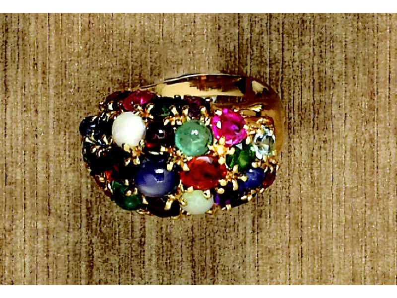 Appraisal: GEMSTONE RING Lady's yellow gold multi colored stone ring featuring