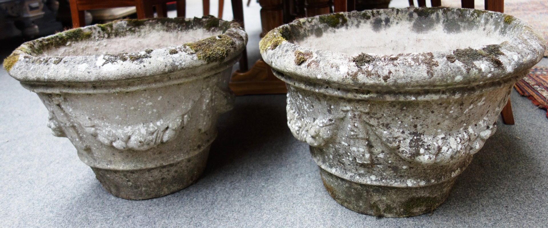 Appraisal: A set of four composition stone planters each with tapering