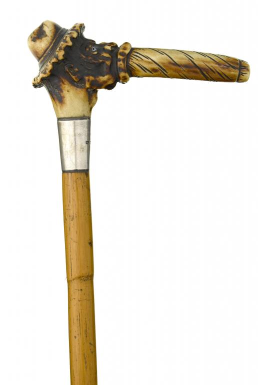 Appraisal: AN EDWARD VII STAGHORN HANDLED CANE the handle carved as