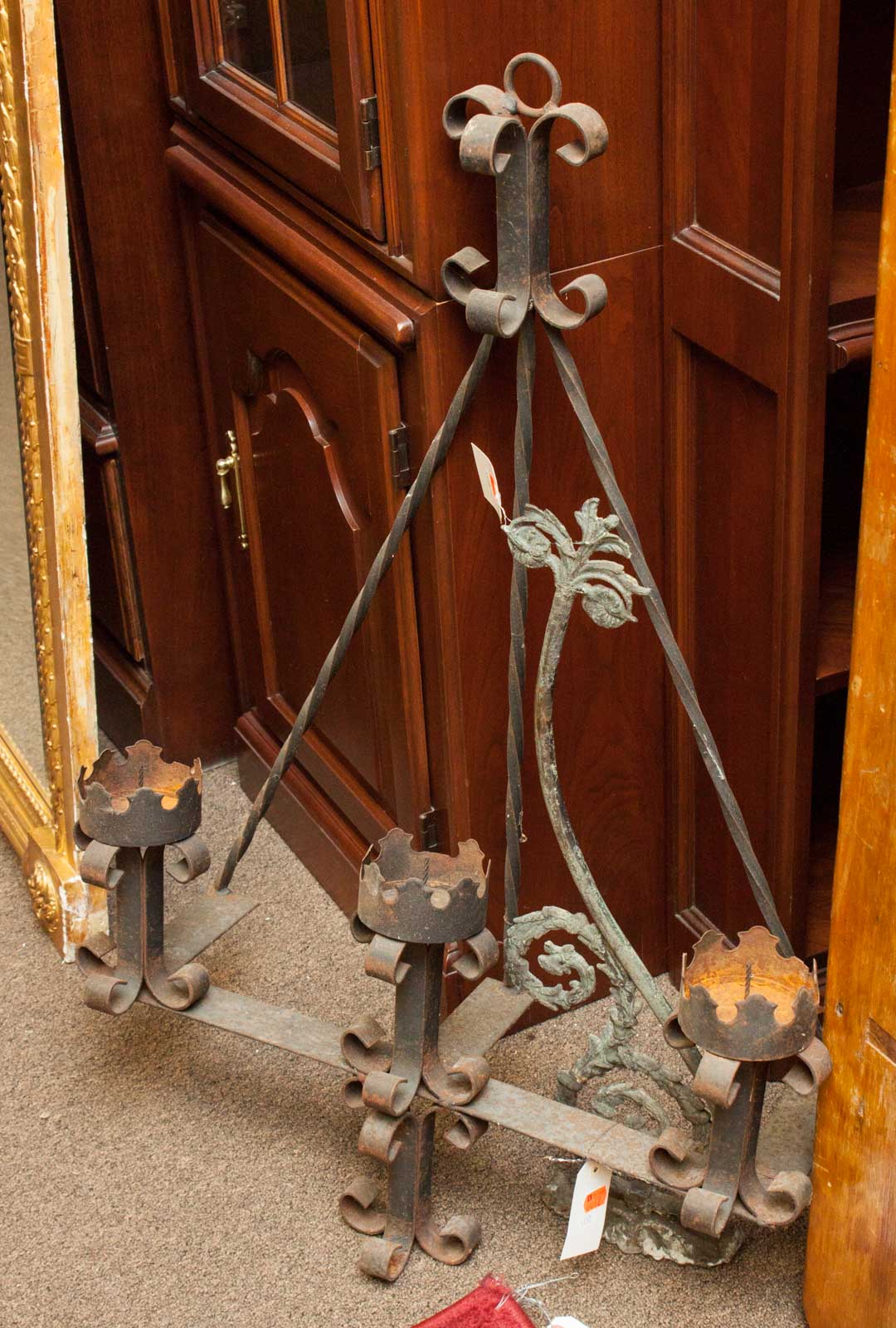 Appraisal: Two pieces of decorative iron hanging candle holder and floral