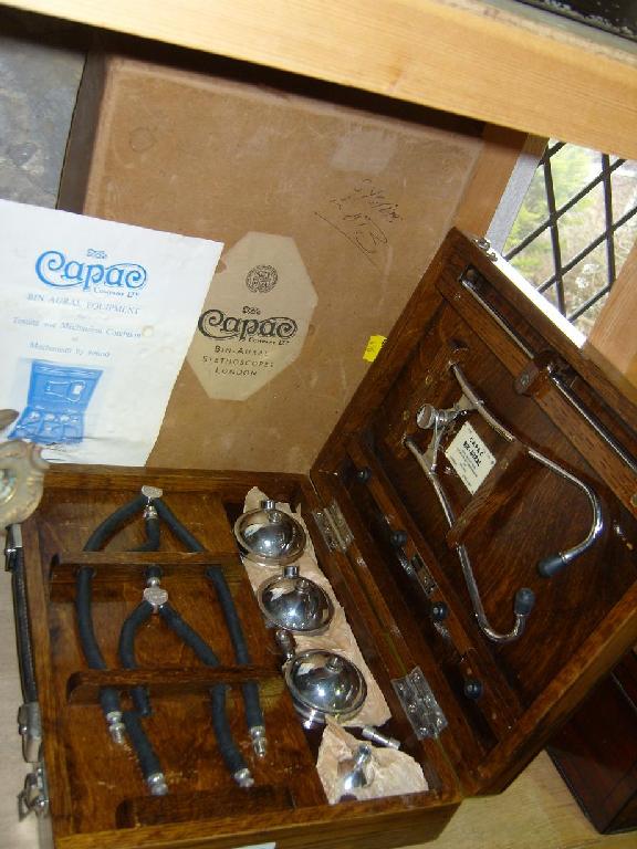 Appraisal: A boxed Capac Bin-Aural stethoscope together with original packaging and