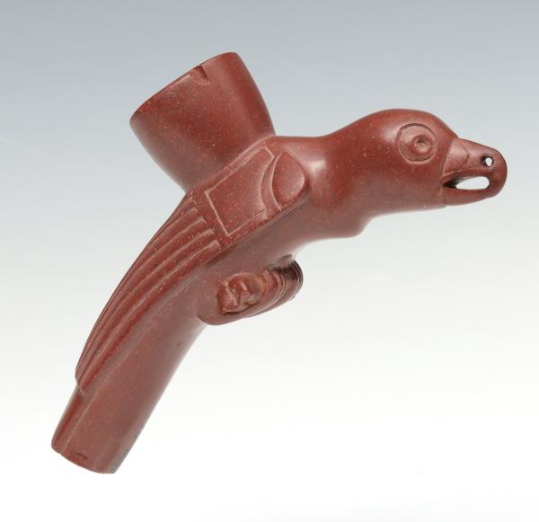 Appraisal: A RAVEN EFFIGY CARVED CATLINITE PIPE BOWLThe detailed carving from