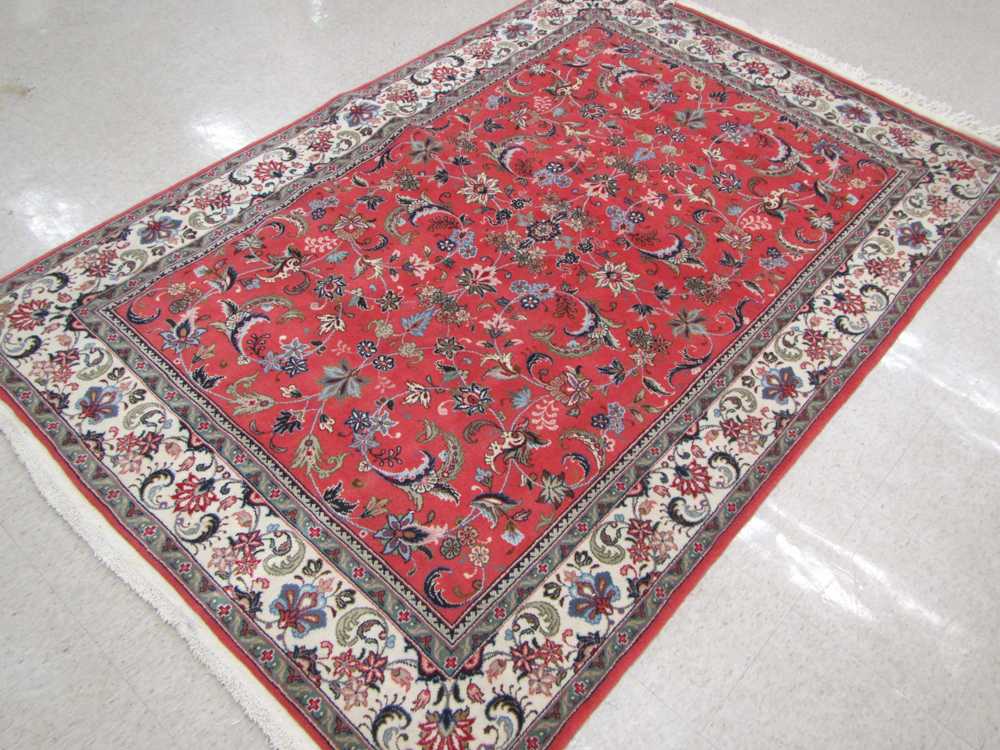 Appraisal: HAND KNOTTED ORIENTAL AREA RUG Indo-Persian overall floral design on