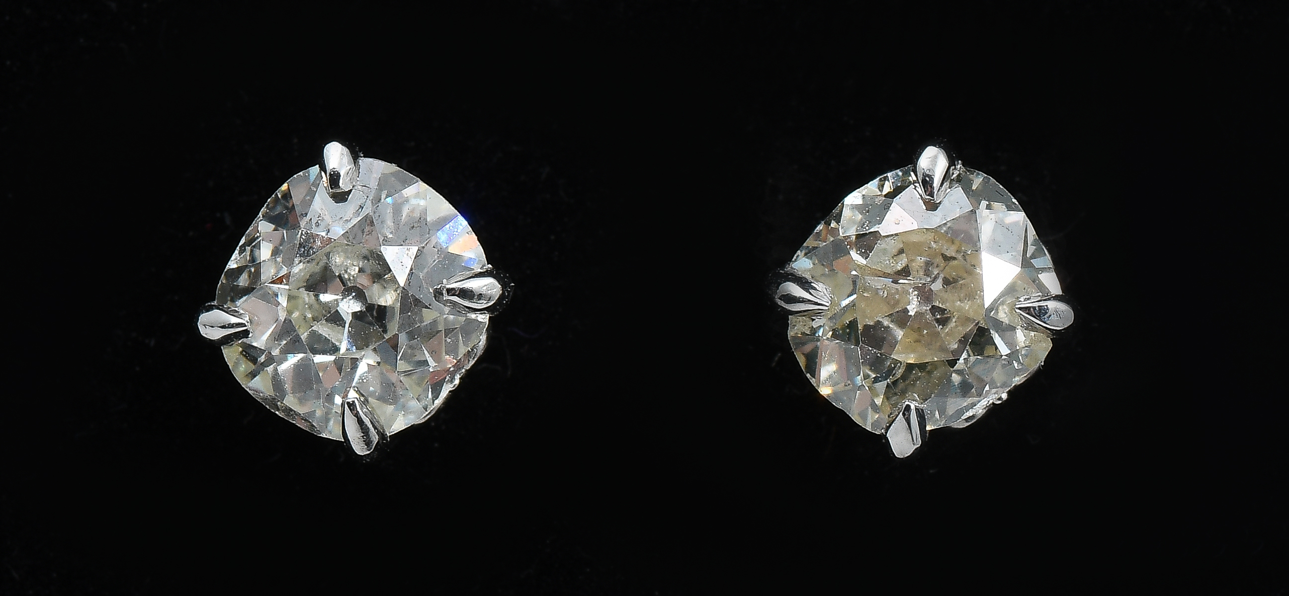 Appraisal: PLATINUM CTW DIAMOND STUDS old mine cut diamonds approximate CTW