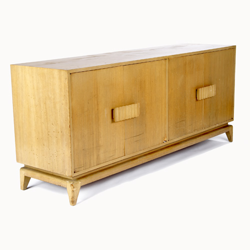 Appraisal: VLADIMIR KAGAN Custom-designed mahogany veneer dresser with four doors hiding