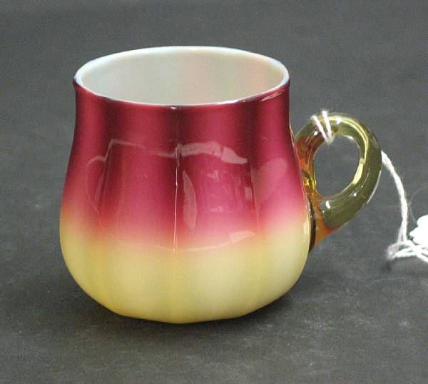 Appraisal: A plated amberina punch cup with amber handle late th