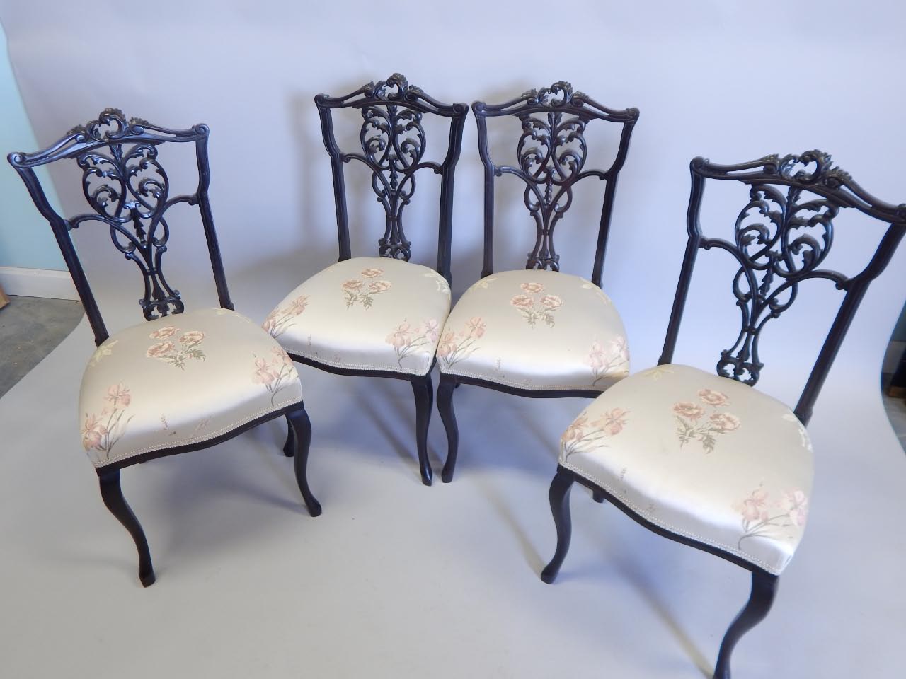 Appraisal: A set of four late Victorian ebonised salon type chairs