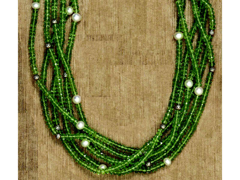 Appraisal: PERIDOT BEAD NECKLACE Six strand faceted peridot beads with mm